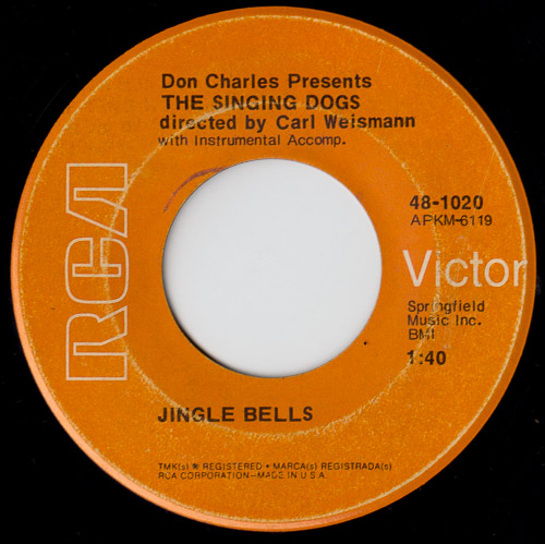 CARL WEISMANN PRESENTS THE SINGING DOGS JINGLE BELLS